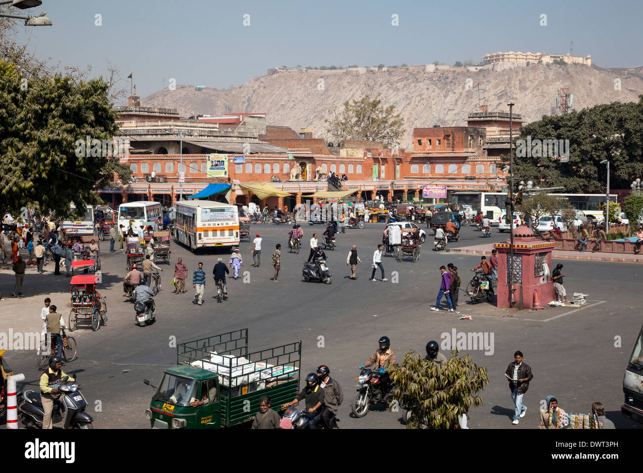 Jaipur, Rajasthan, India. Mid-day Traffic in Central Jaipur. Nahargarh Fort on Hilltop in the Distrance. Stock Photo