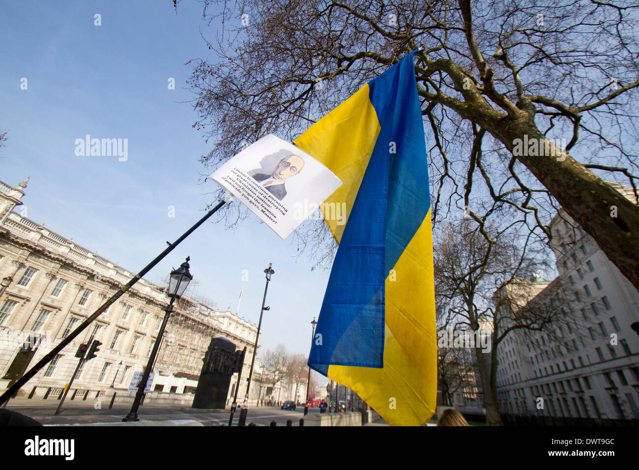 Westminster London, UK. 13th March 2014.Ukrainian protesters continue to hold a 24hour shift protest outside Downing Street with placards following the Russian military intervention in the Crimea demanding on the British Government to impose economic sanctions on the Russian Government Credit:  amer ghazzal/Alamy Live News Stock Photo
