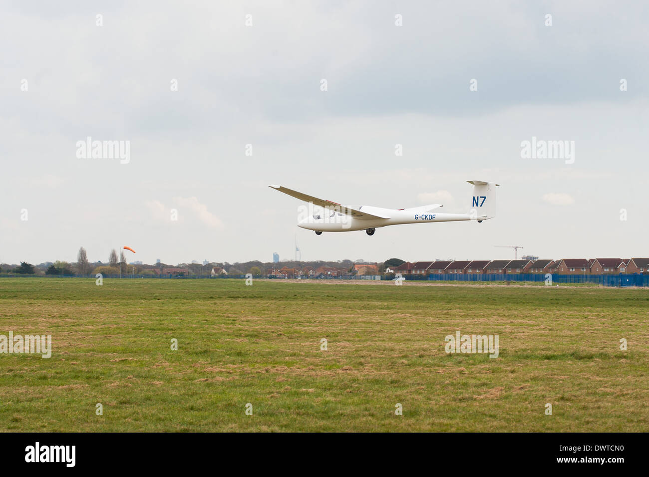 Glider landing at airfield, Lee on Solent Stock Photo