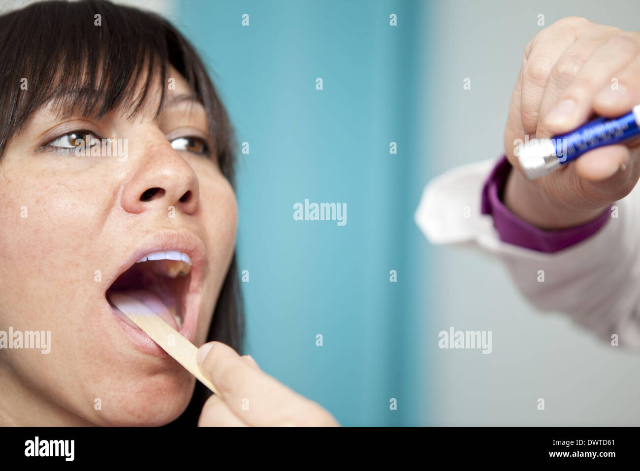 Woman doctor throat auscultation hires stock photography and images