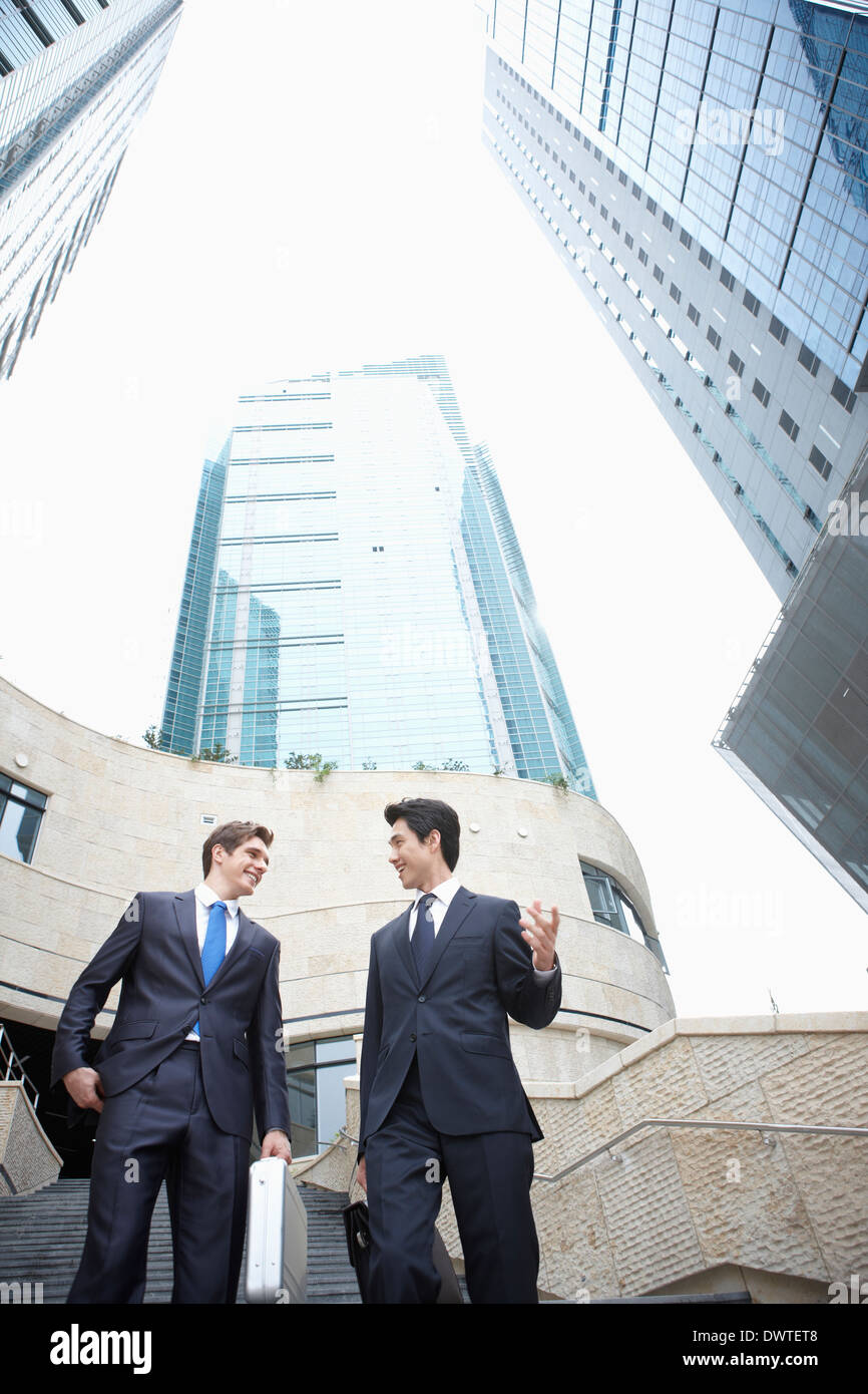 two business men walking the stairs together Stock Photo - Alamy