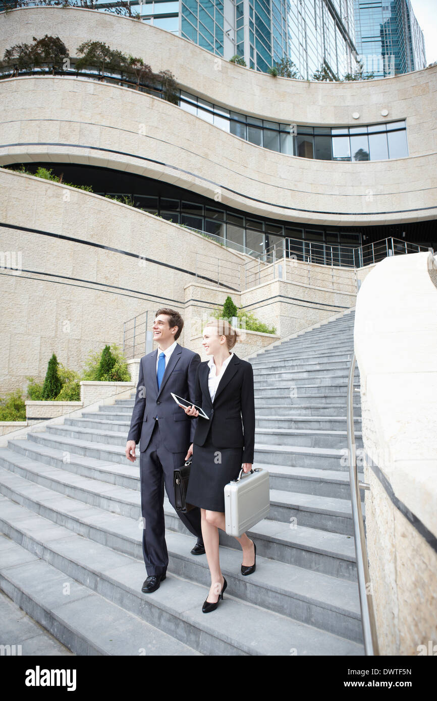 two business people walking the stairs Stock Photo - Alamy