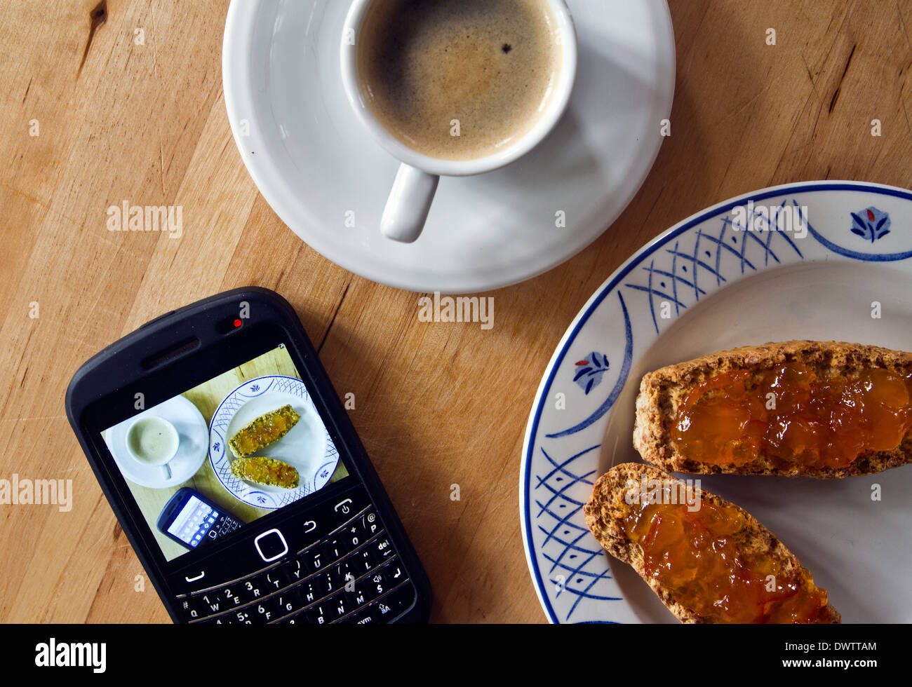 Blackberry phone with coffee Stock Photo