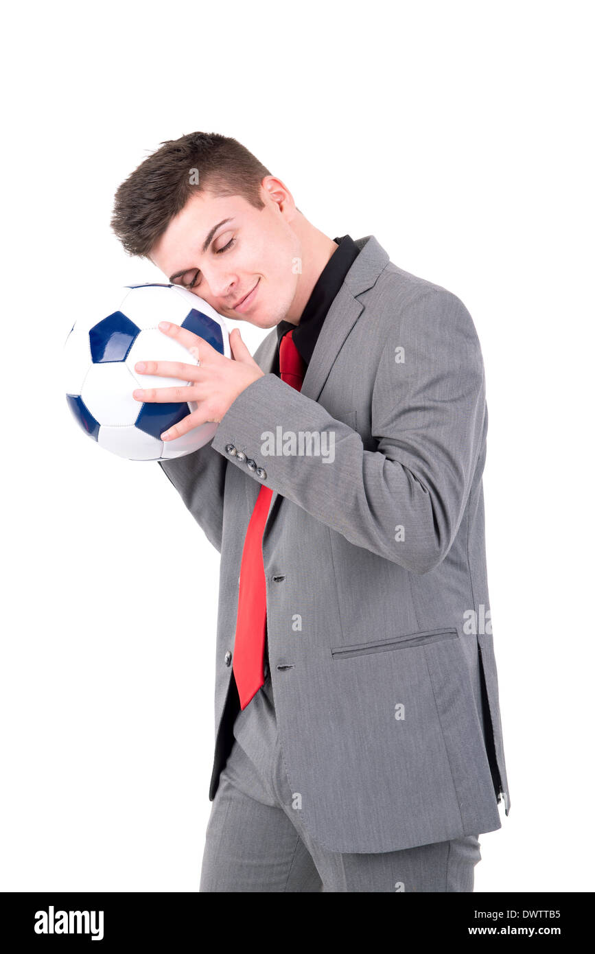 Businessman holding soccer ball isolated in white Stock Photo - Alamy