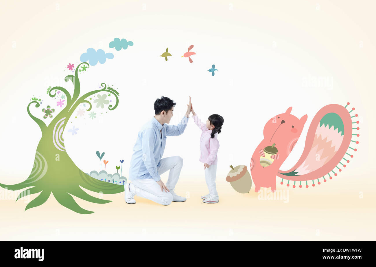 a father playing with daughter Stock Photo
