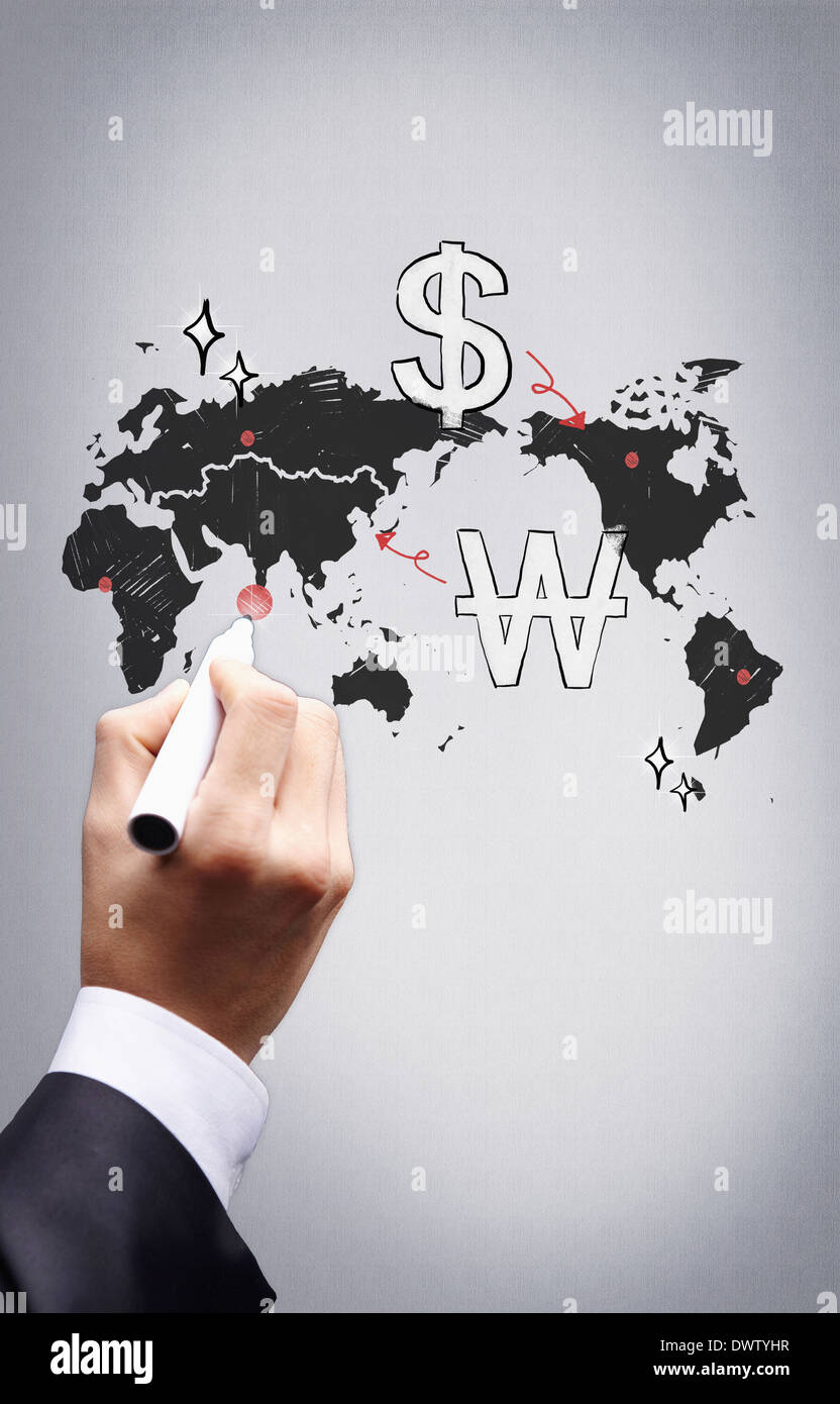 a business man drawing on the world map Stock Photo - Alamy