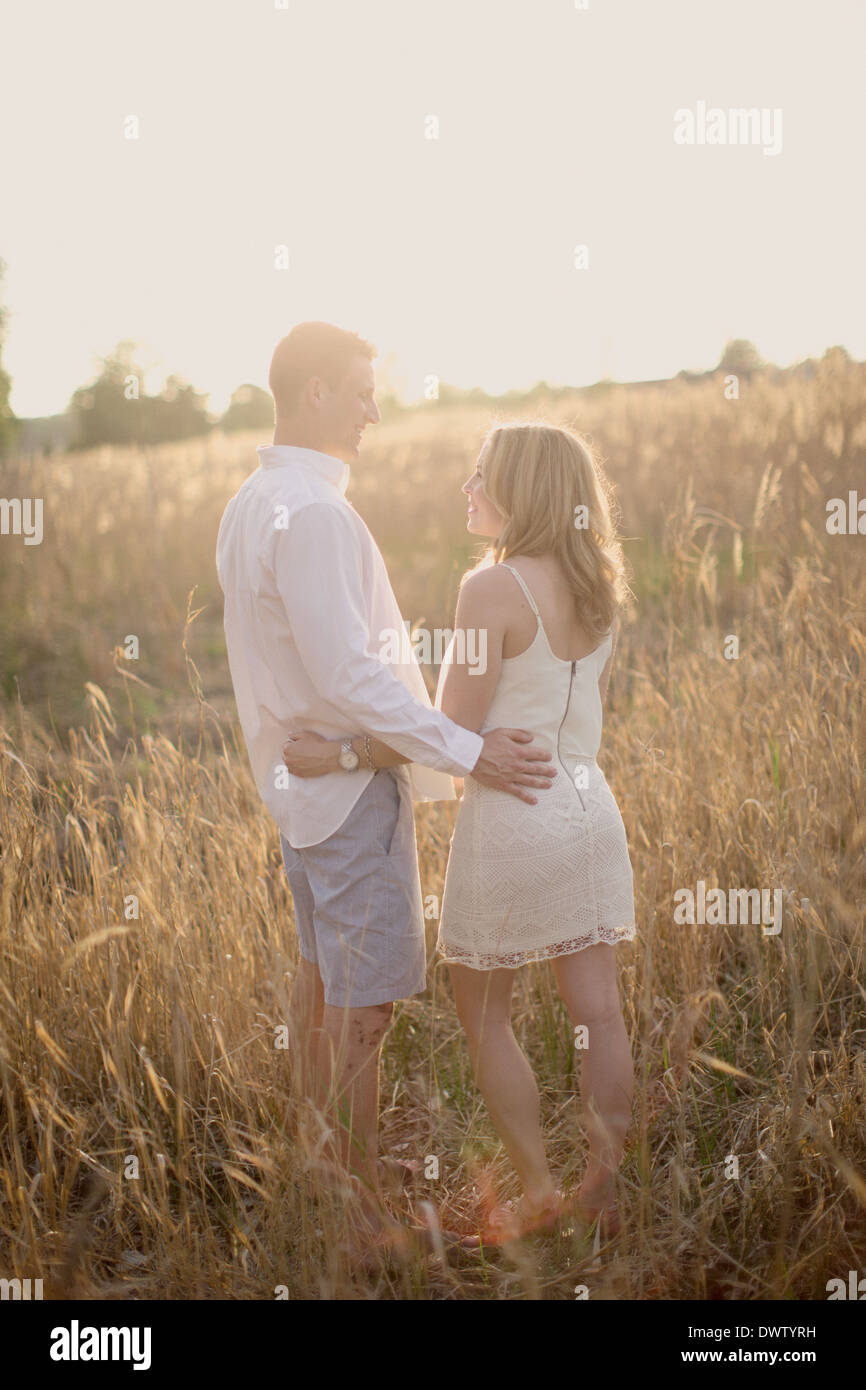 couple in field Stock Photo