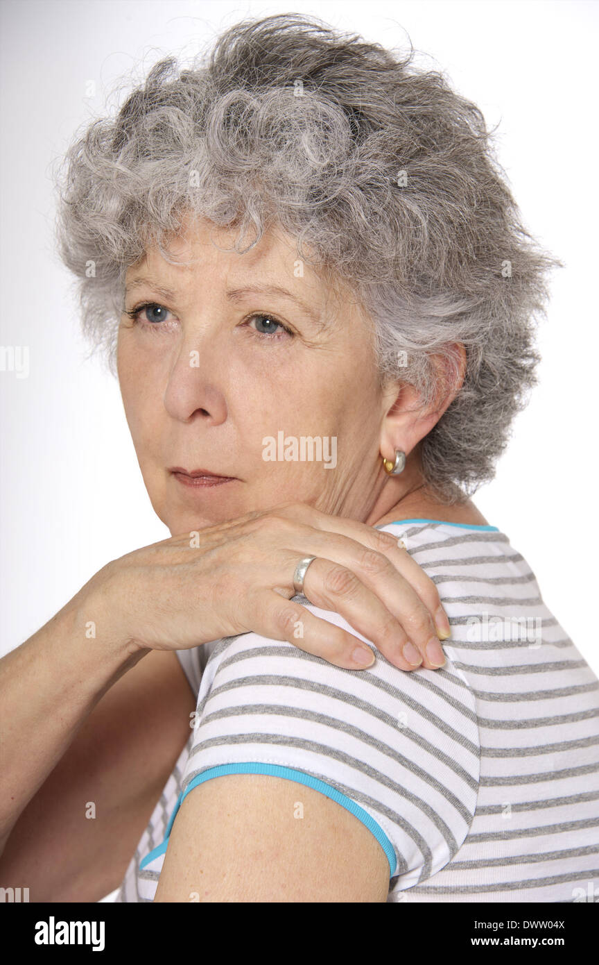 Shoulder pain senior Stock Photo - Alamy