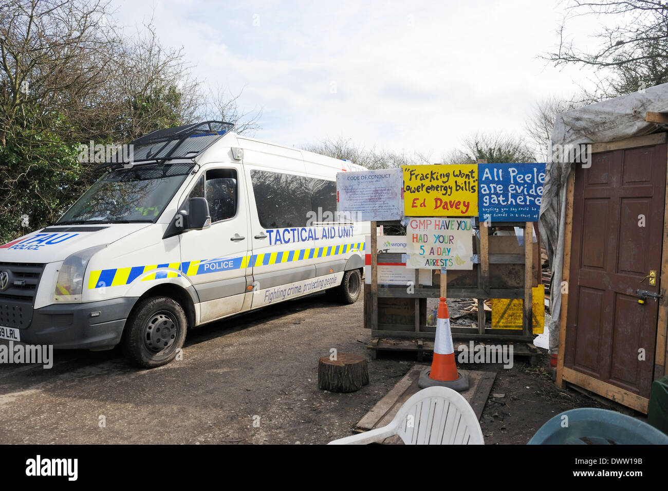 Greater Manchester Police Tactical Aid Unit van passing the anti-fracking protester camp at Barton Moss. Stock Photo