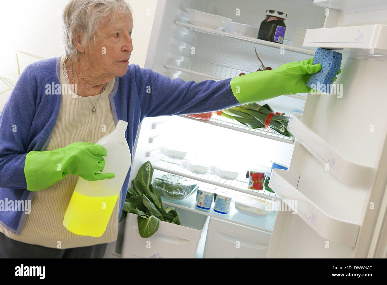 Interior house cleaning senior Stock Photo Alamy