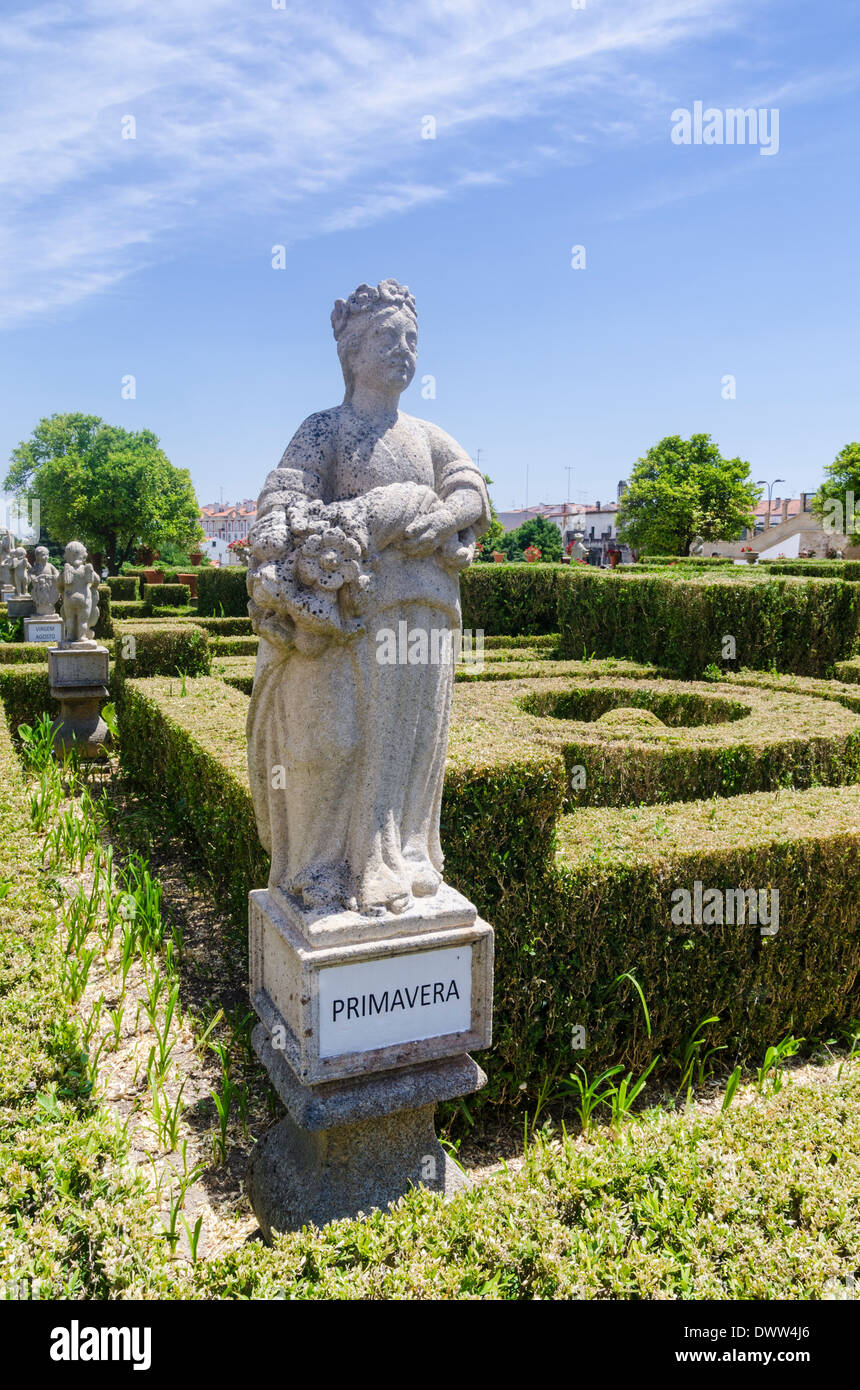 Spring, one of the four seasons statues in the Episcopal Palace Garden of Castelo Branco, Beira Baixa, Portugal Stock Photo