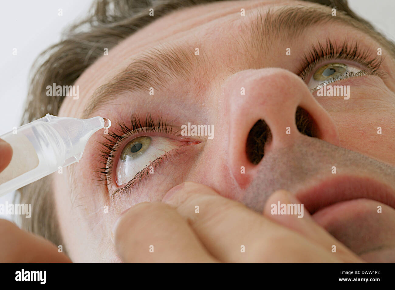 Treatment drop man Stock Photo Alamy