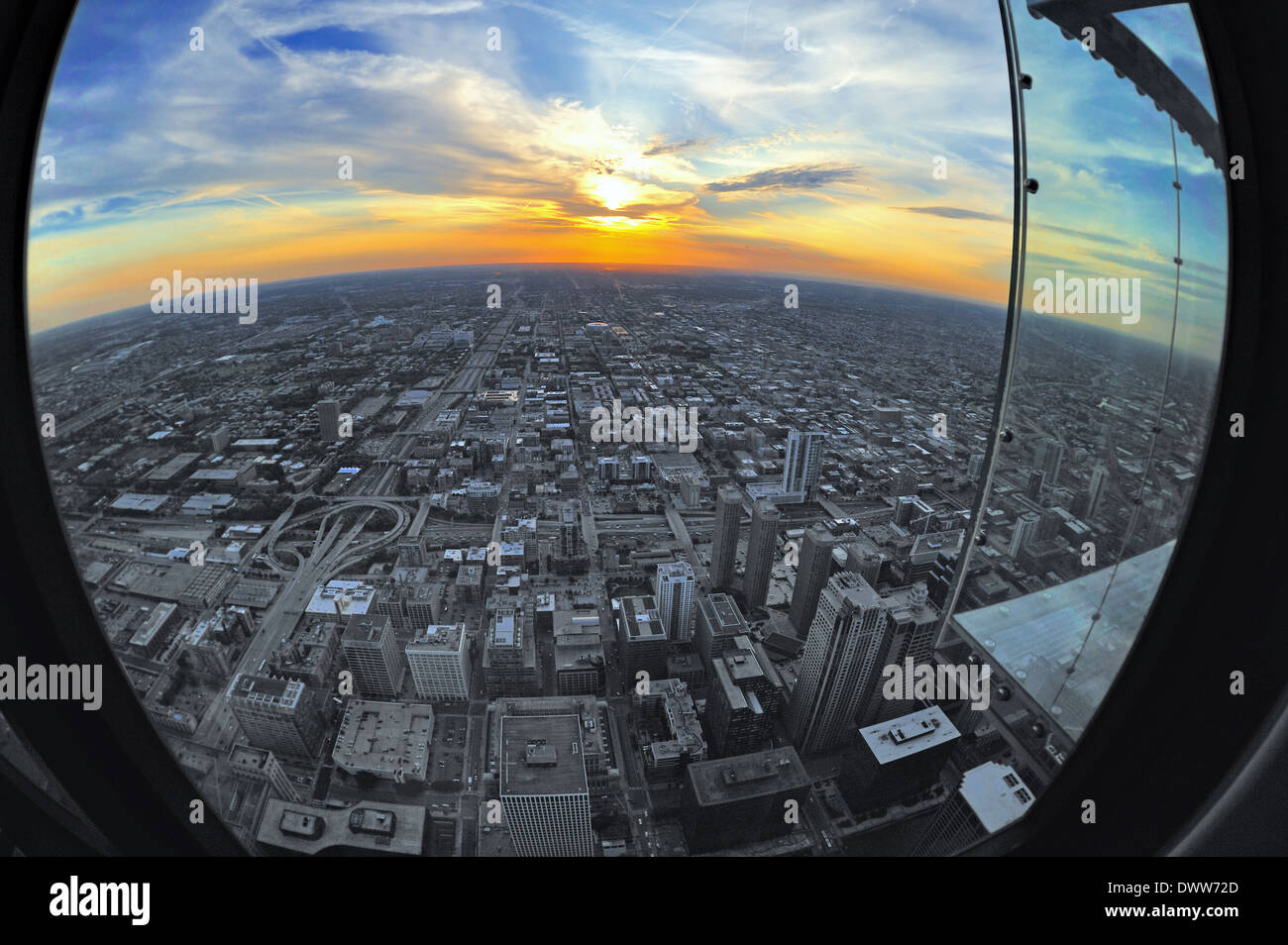 USA Illinois Chicago window atop Willis Tower circular view sunset west side. Stock Photo