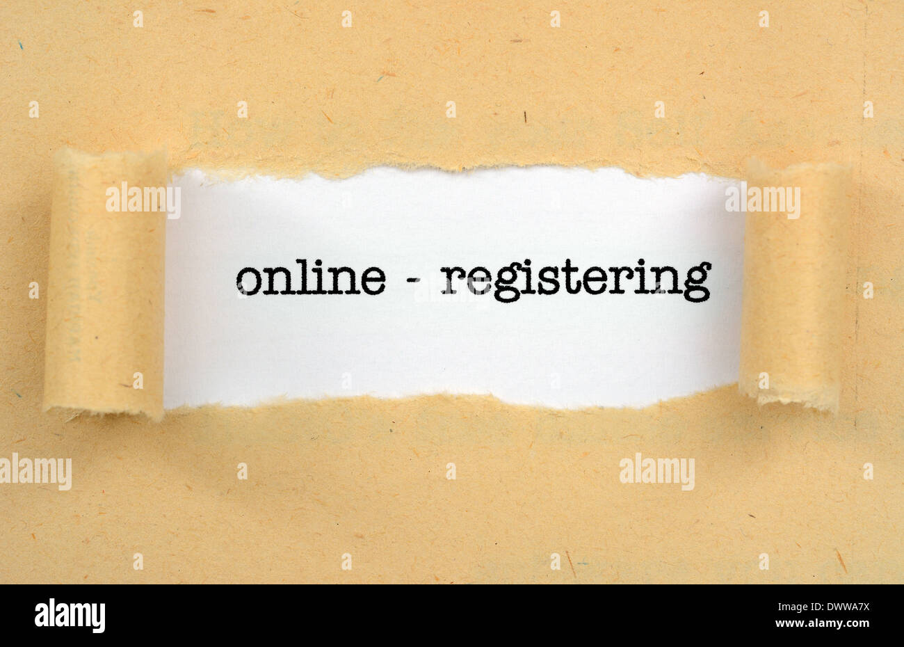 Online - regisrering text on paper hole Stock Photo