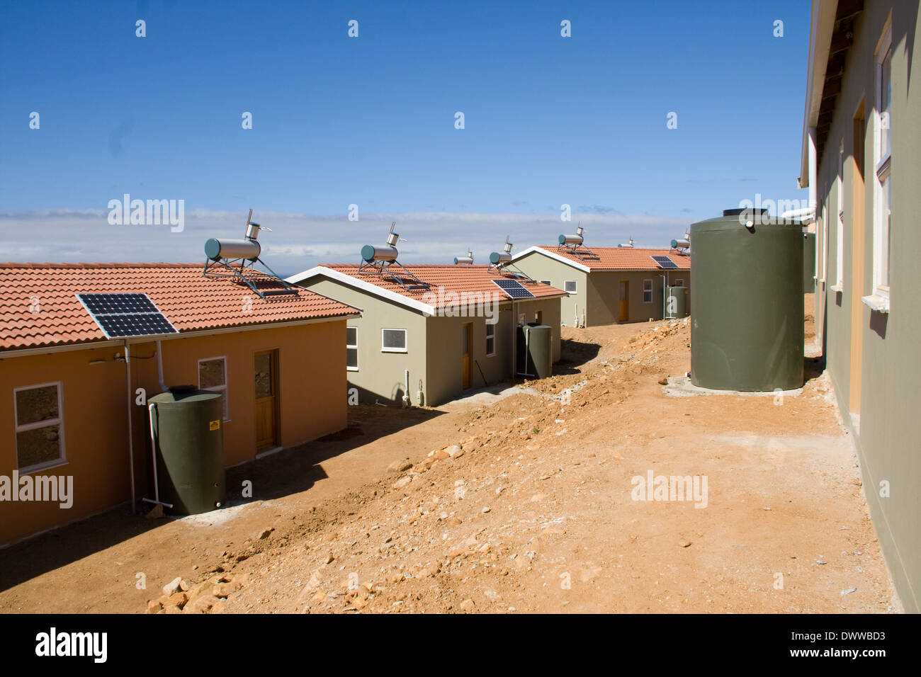 Plastic water tanks are installed in this lowcost housing develoopment to catch rainwater from