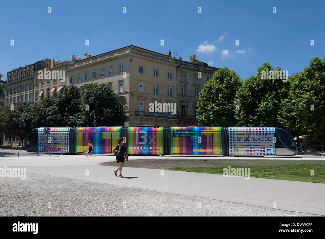 Bordeaux France Tramway decorated for advertising the 2013 political candidates in the Place des Quinconces near the Monument a. Stock Photo