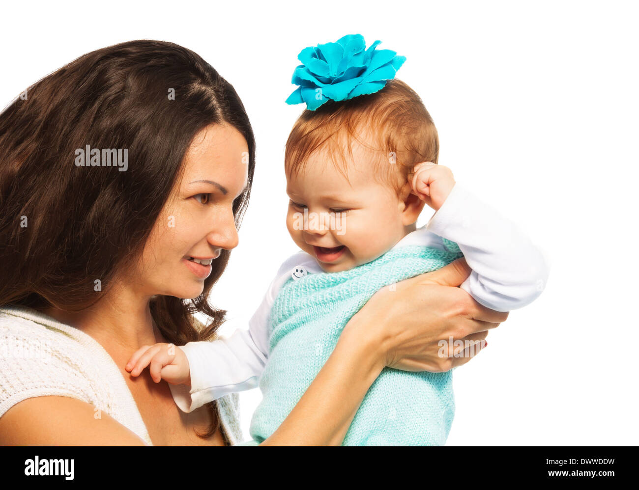Mother holding and playing with little baby girl, isolated on white Stock Photo