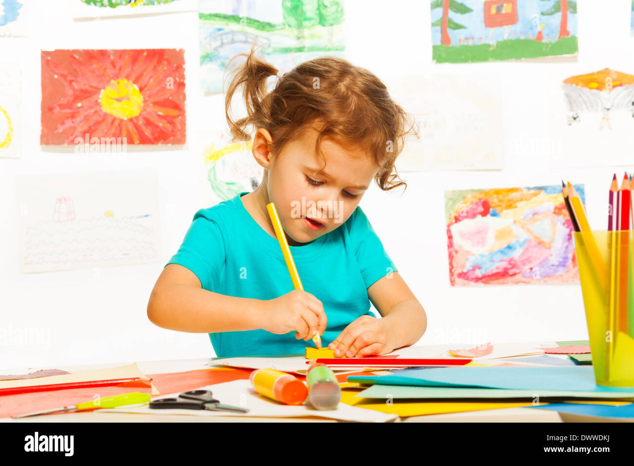 One happy little girl painting on creative class in kindergarten Stock ...