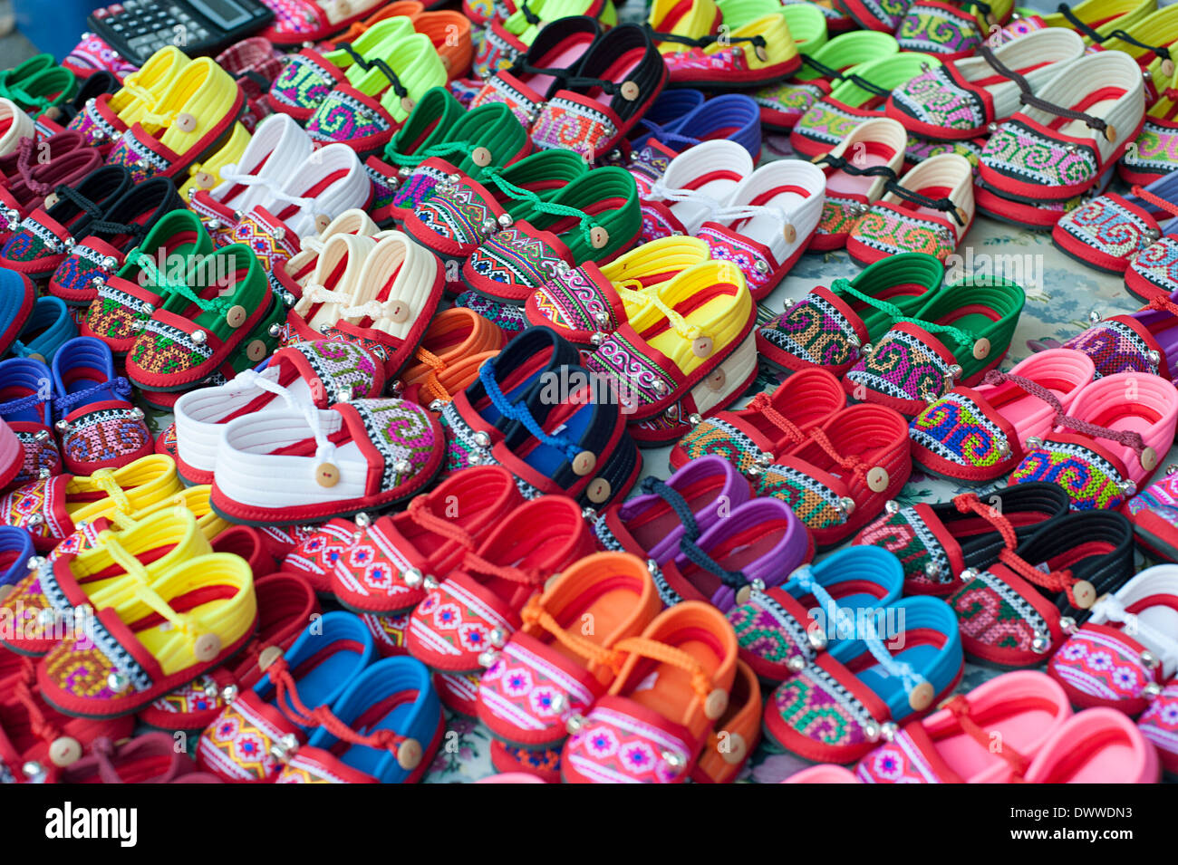 Brightly colored kids shoes for sale in 