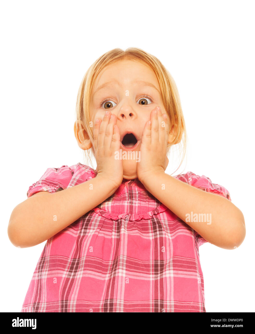 Shocked little blond 4 years old girl holding face with hands Stock Photo