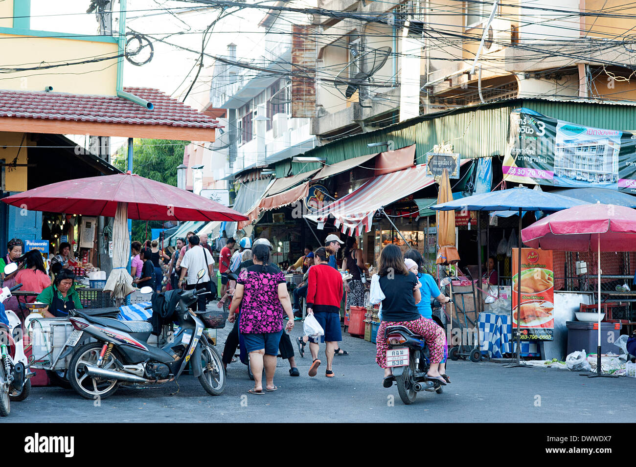 Market area busy with locals and tourists near Ping Canal in Chiang Mai. Stock Photo