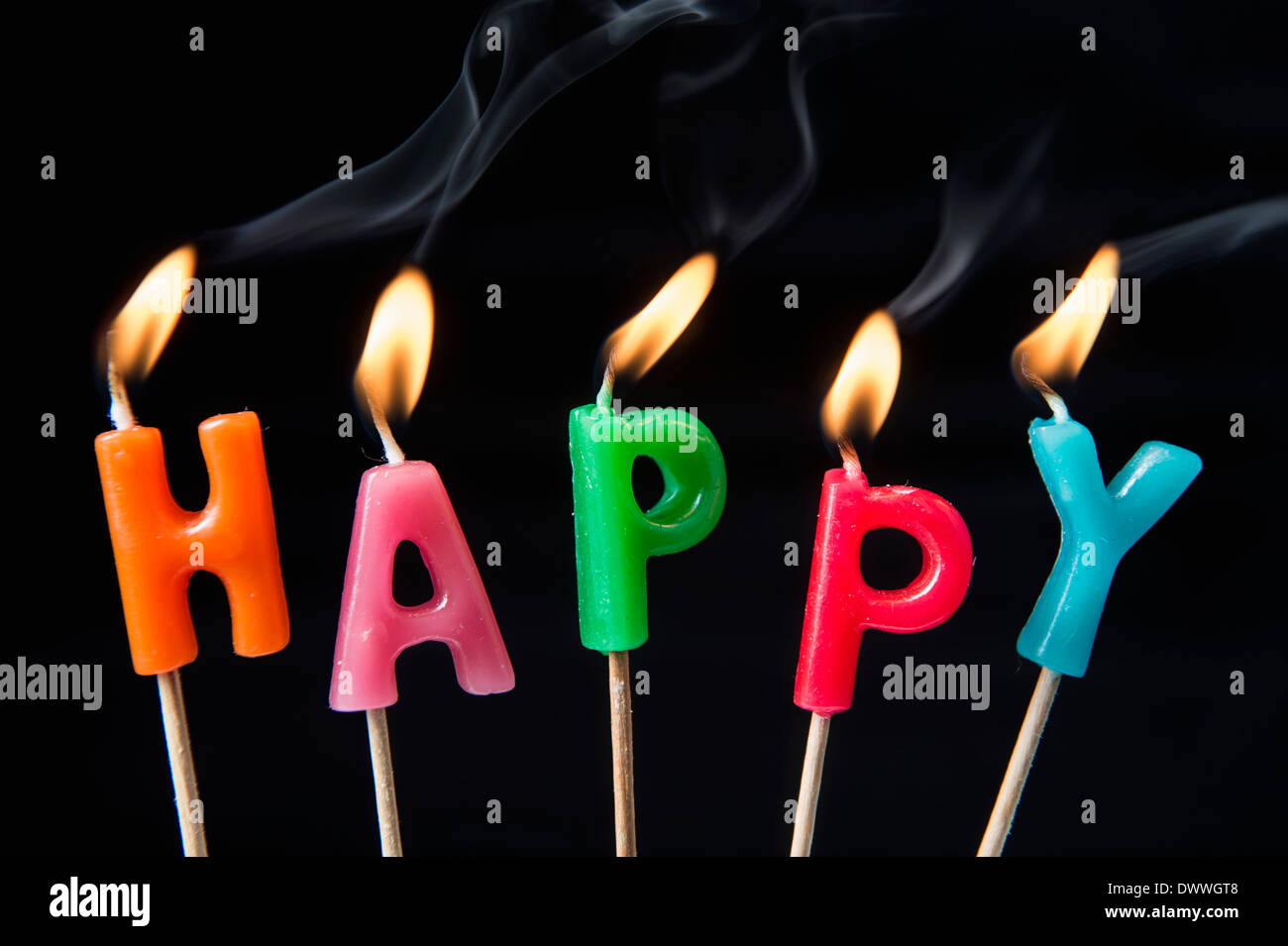 candles burning saying happy Stock Photo Alamy