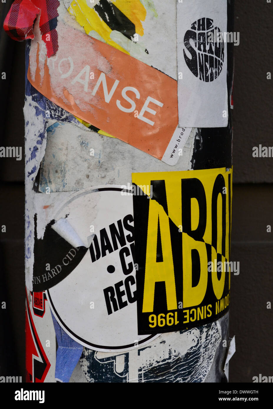Stickers on a pole in Shoreditch, east London Stock Photo Alamy