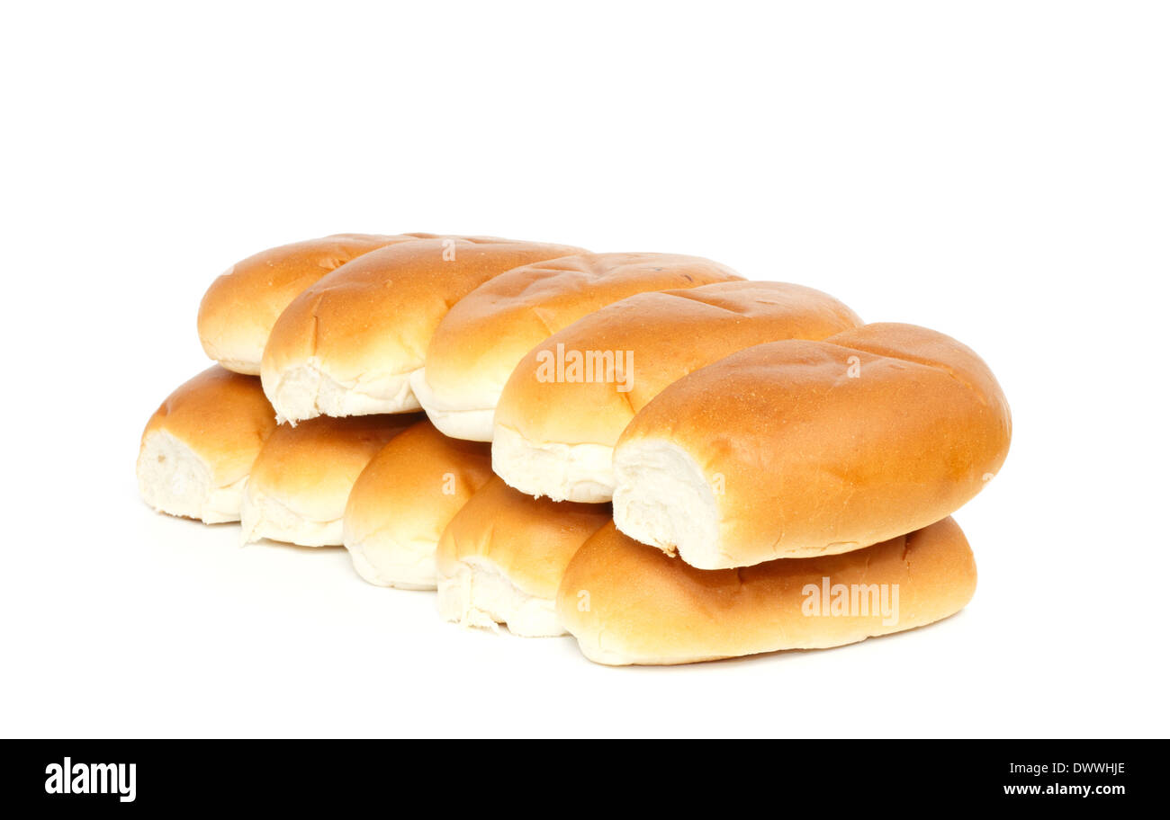 Two rows of bread rolls against white background Stock Photo