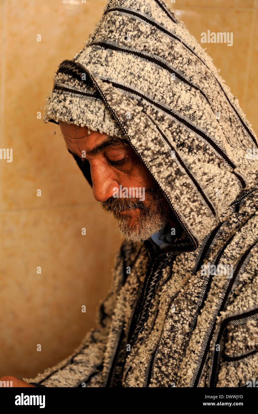 Portrait of Moroccan man dressed in traditional Berber Djellaba, Marrakech, Morocco Stock Photo