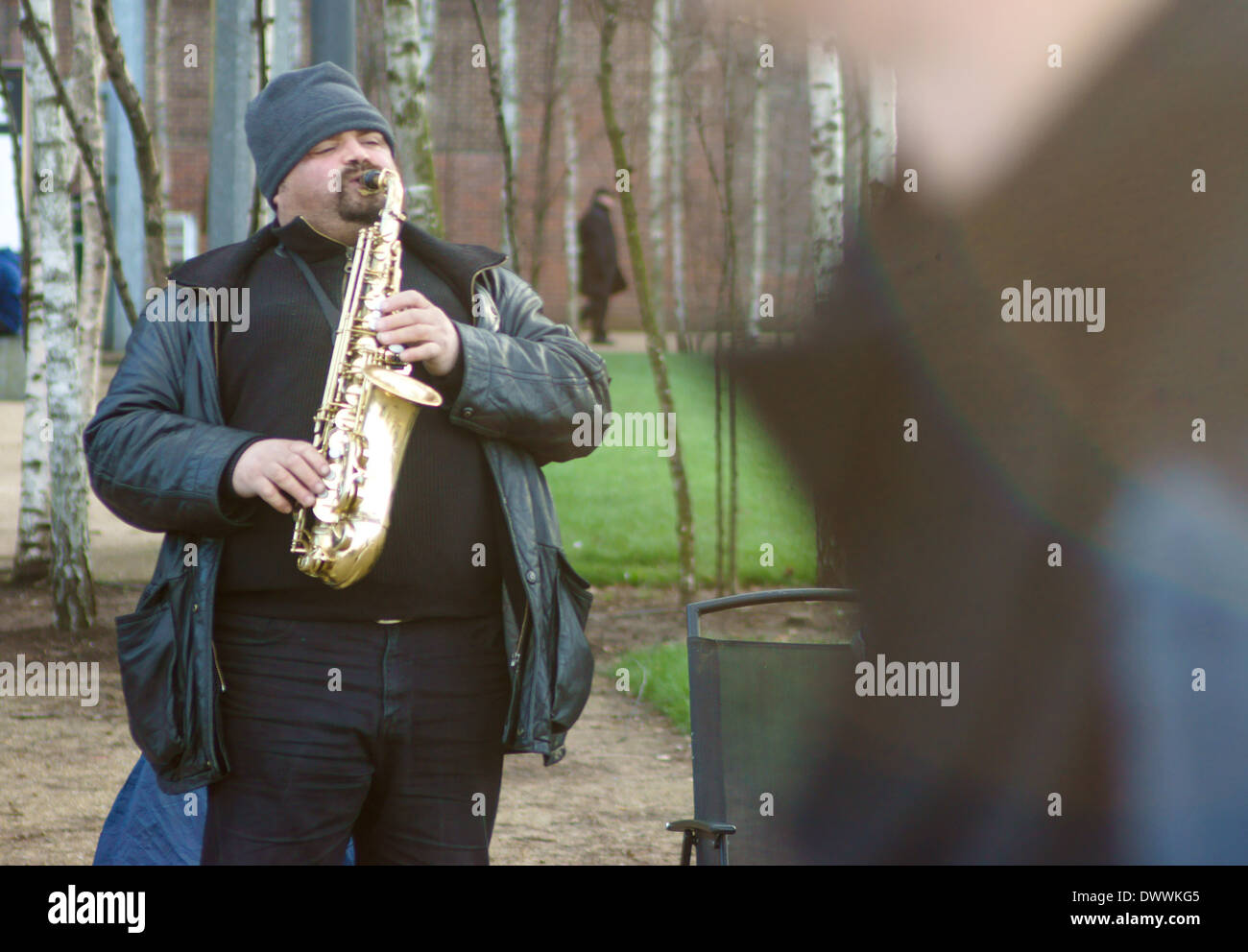 street musician in London. Saxophone player on street Stock Photo
