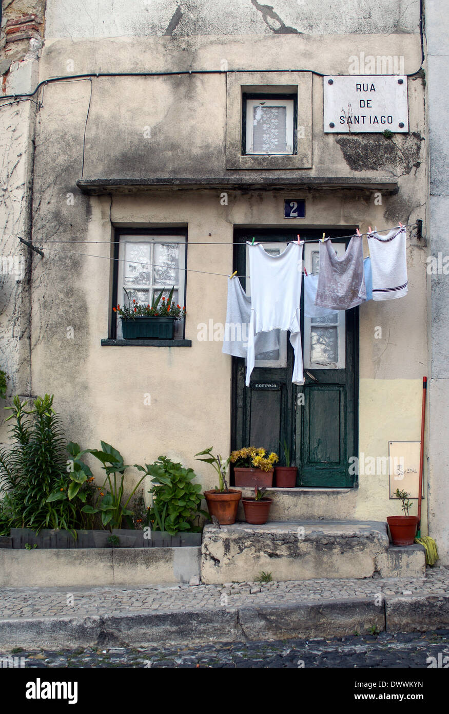 washing hanging outside house in Lisbon Stock Photo