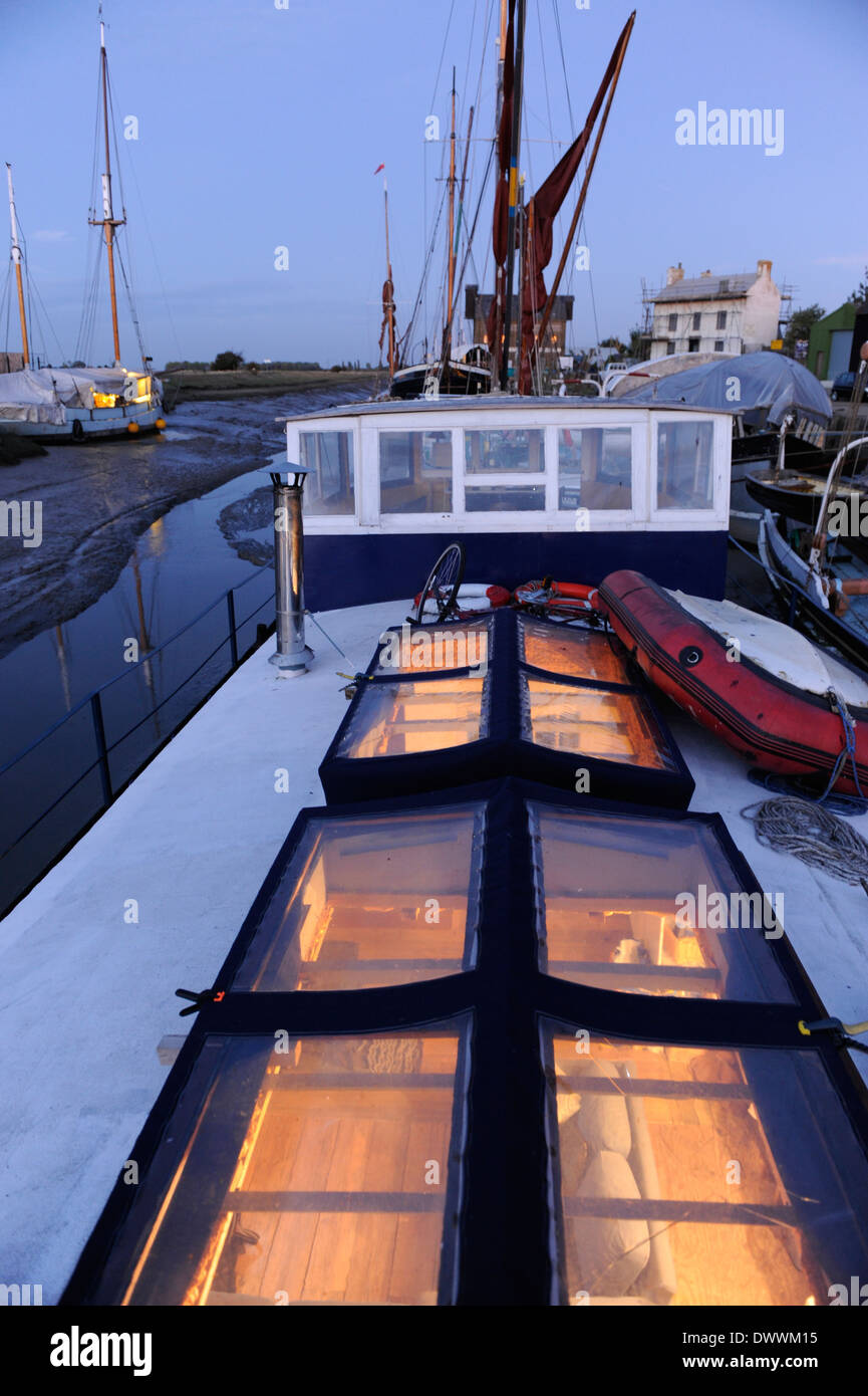 1936 Humber Keel barge Houseboat at dusk at Faversham creek Stock Photo