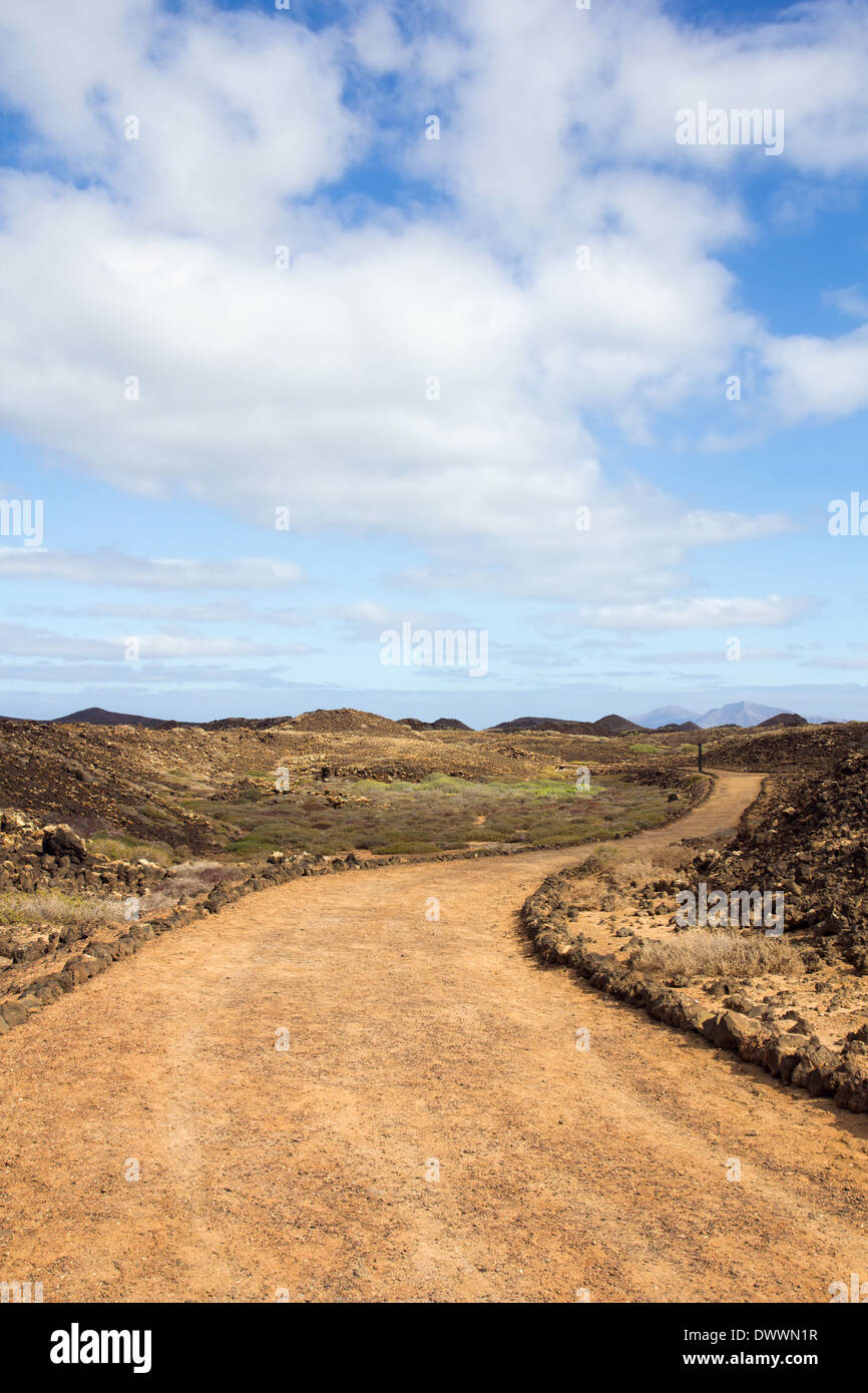 Curvy trail on Los Lobos, near Fuerteventura, in the Canary Islands, Spain. Stock Photo