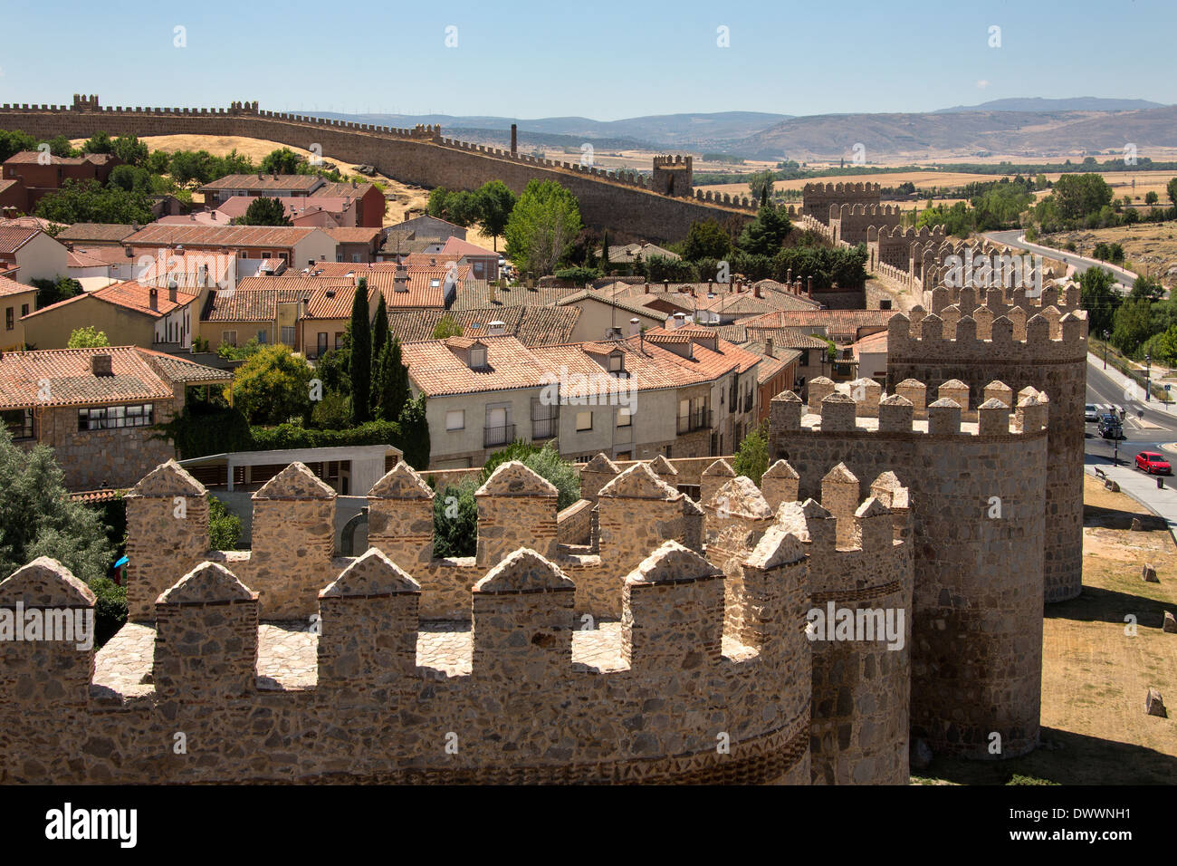 The medieval city walls and the city of Avila in the Castilla-y-Leon region of central Spain. Stock Photo