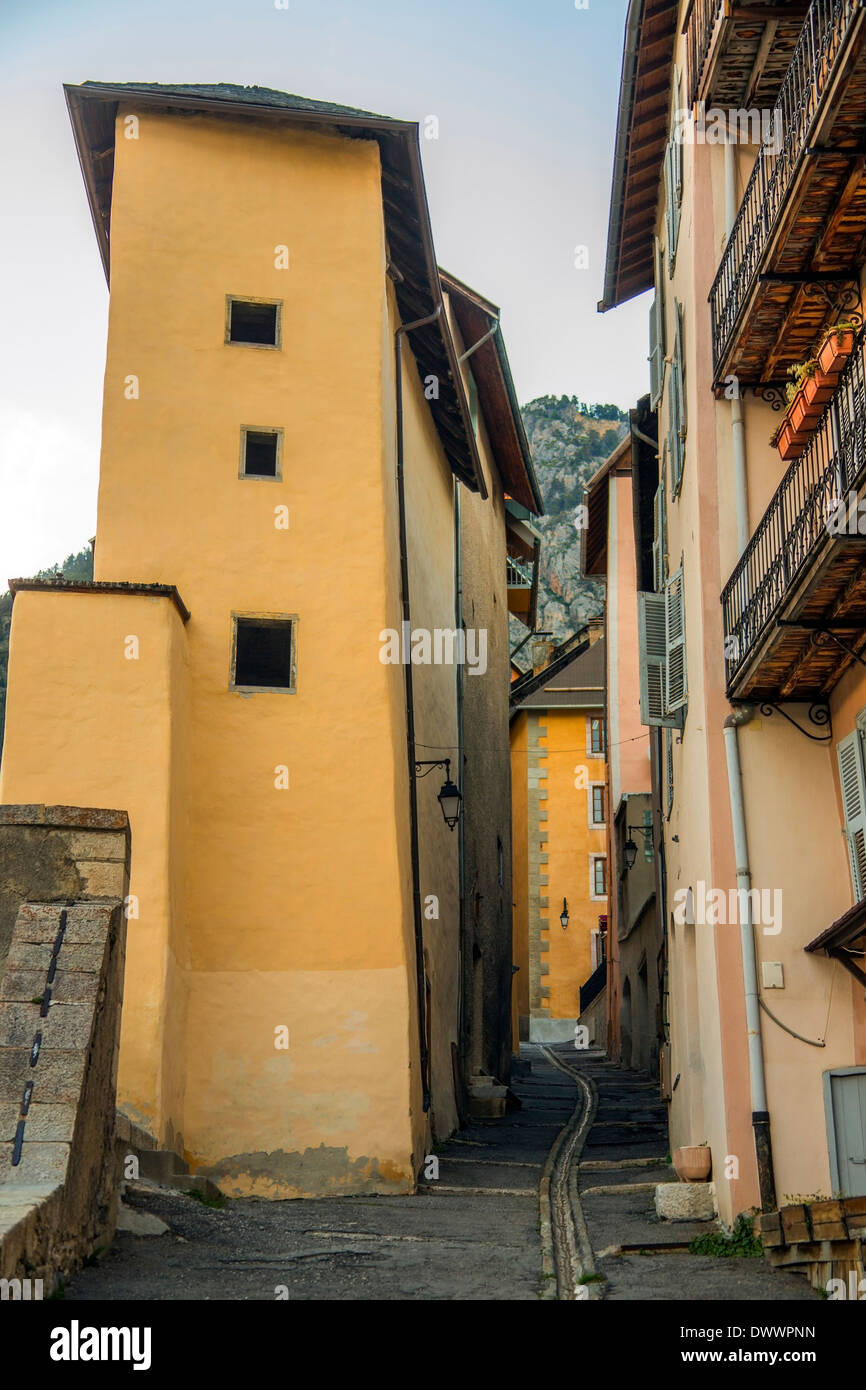Narrow street in the old fortified city of Briancon in the Provence-Alpes-Côte d'Azur region in southeastern France. Stock Photo