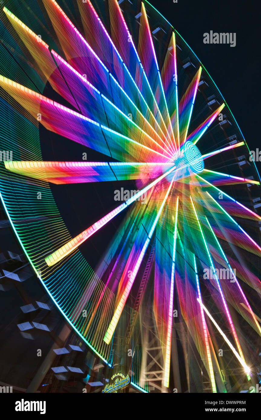 Motion Blur and Zoom Effect Image of The Great Smoky Mountain Wheel at Twilight on the Island in Pigeon Forge Stock Photo