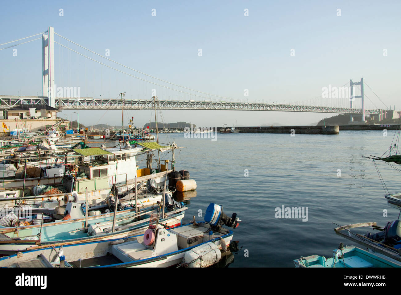 Seto Ohashi Bridge and fishing boats, Japan Stock Photo