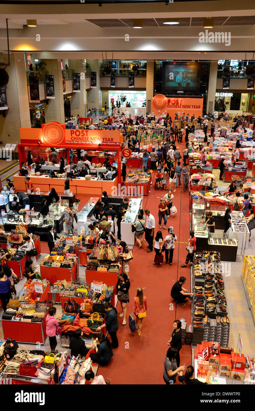 Singaporean shoppers at post Chinese New Year sales at Orchard Road Takashimiaya basement bazaar Singapore Stock Photo