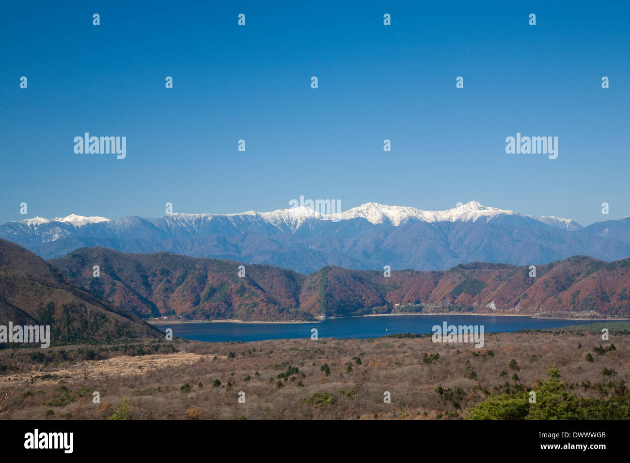 Lake Motosu and snowcapped mountain range, Yamanashi, Japan Stock Photo