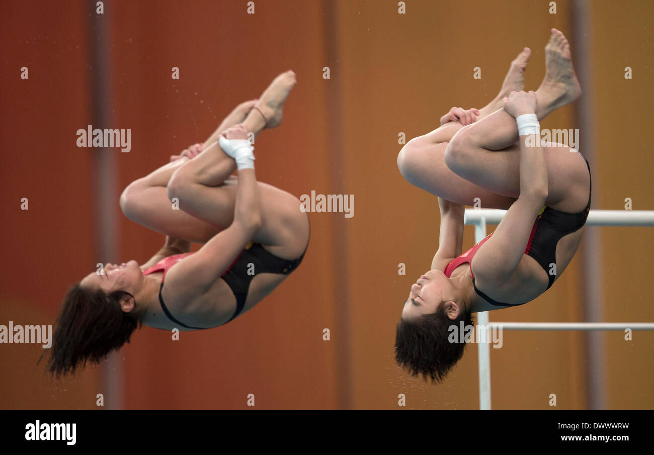 Beijing, China. 14th Mar, 2014. Chen Ruolin/Liu Huixia (R) of China ...