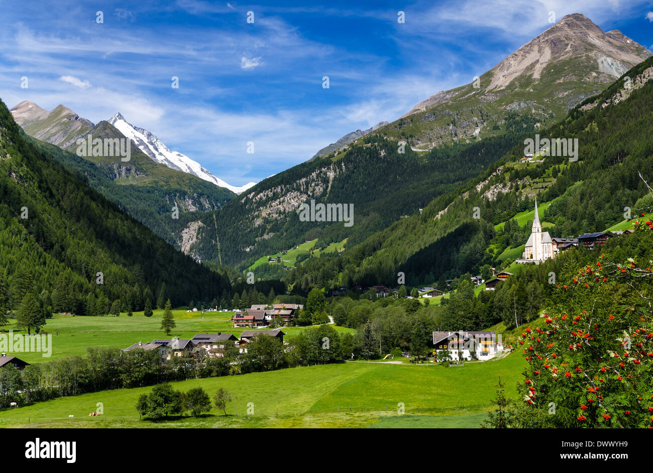 Rural landscape of Heiligenblut, North Tyrol, highest mountain from Austria in background, Grossglockner (3797 m. elevation) Stock Photo