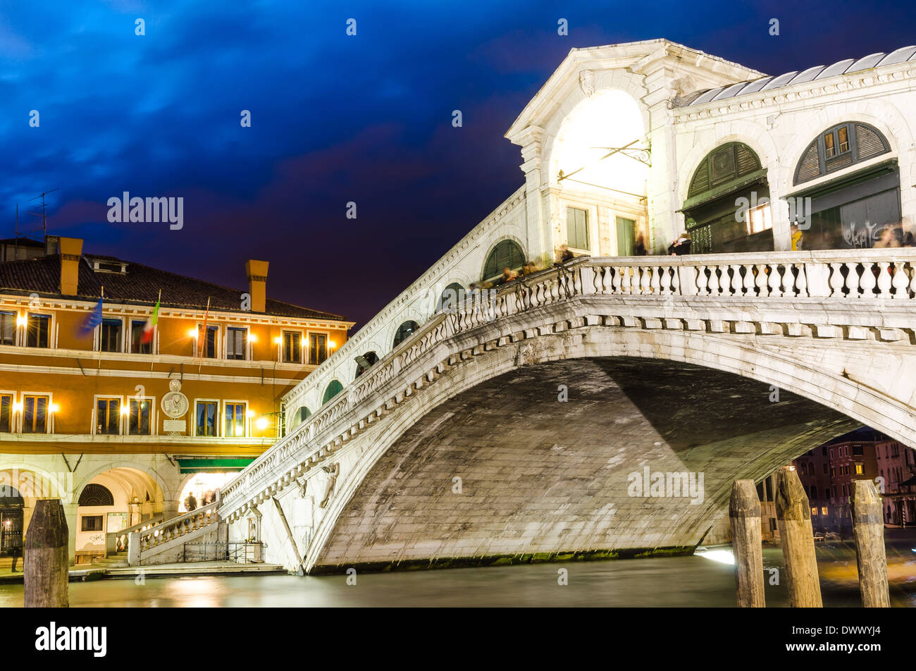 Venice, Italy. Rialto Bridge, Ponte di Rialto, famous touristic attraction in city, medieval architecture, twilight view. Stock Photo