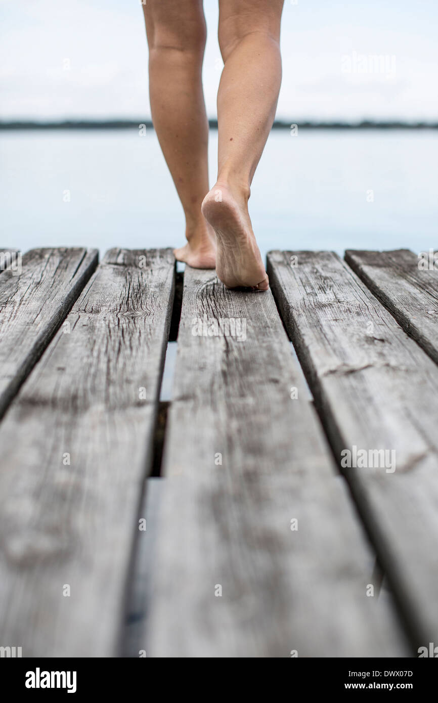 Woman barefoot walking rear hi-res stock photography and images - Alamy