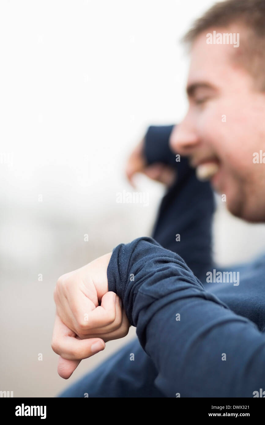 Focus on hand of man with cerebral palsy Stock Photo