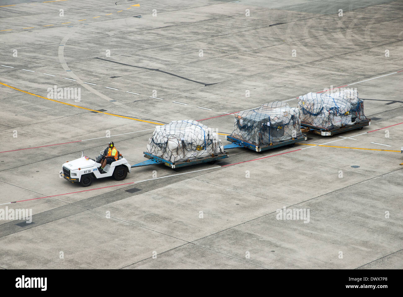 Airport cargo and freight handling truck at Auckland International Airport New Zealand Stock Photo