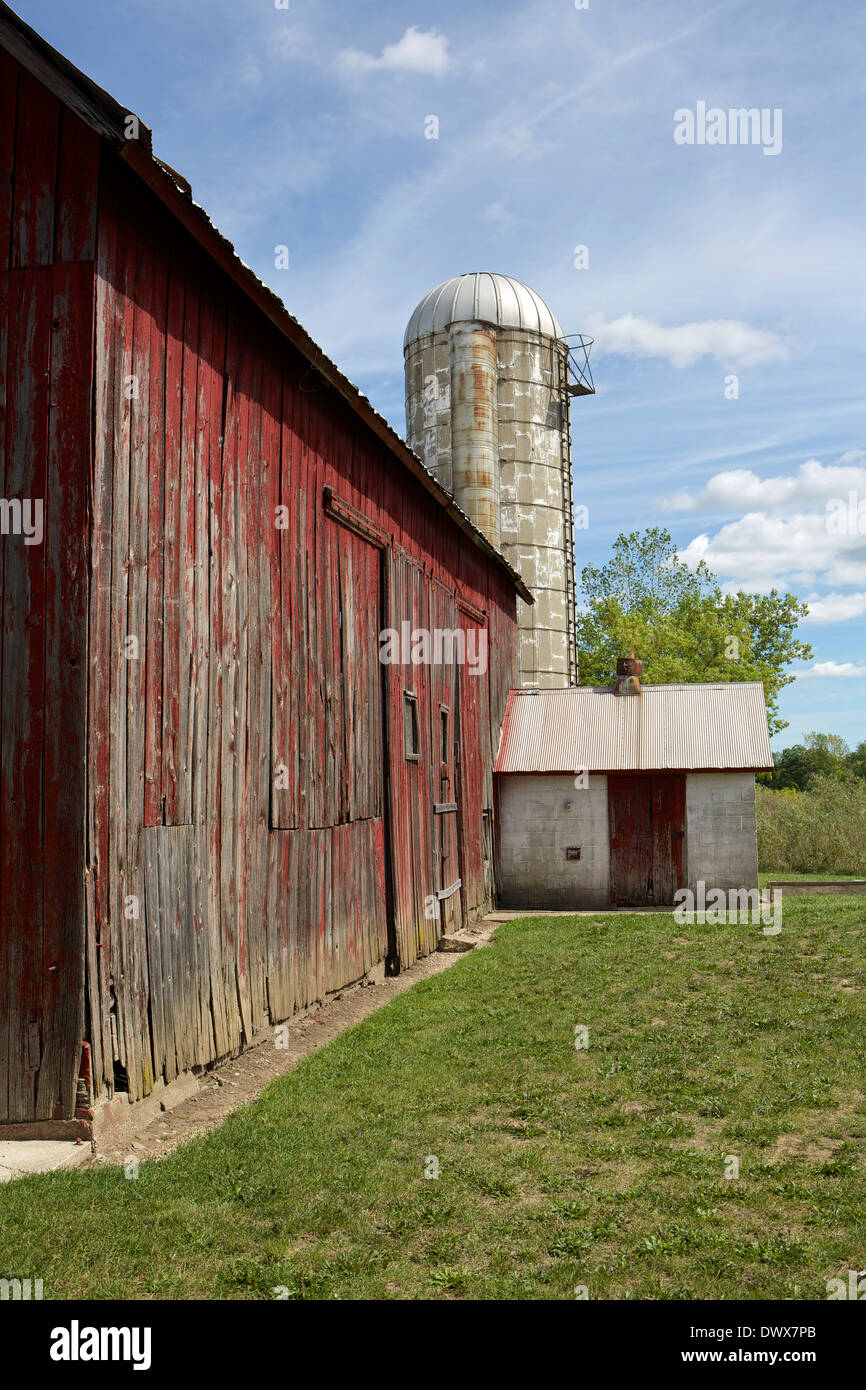 Faded red barn and silo at Grand River Ravines Park Stock Photo