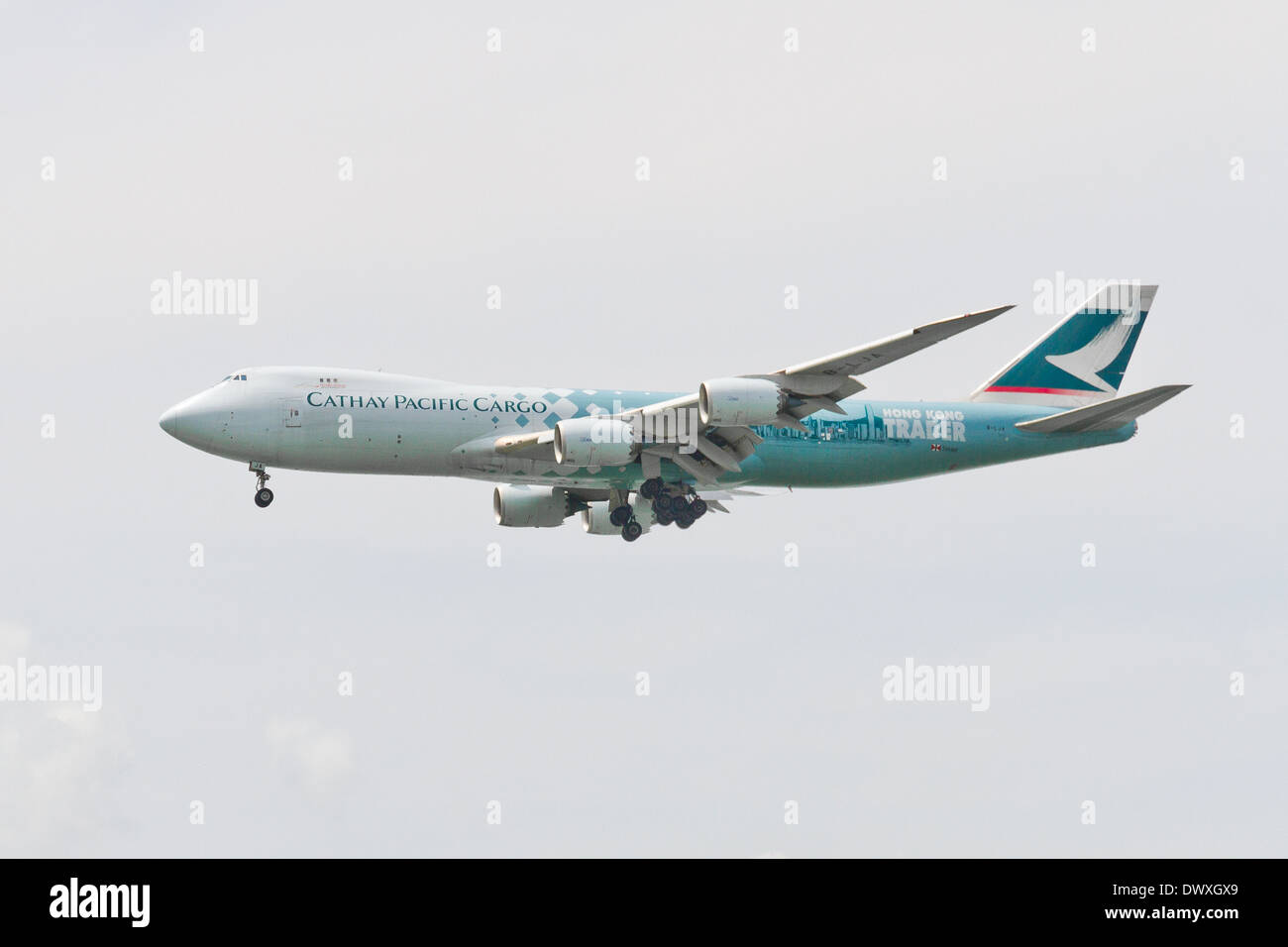 CX CATHAY PACIFIC CARGO Landing to HK Airport Stock Photo
