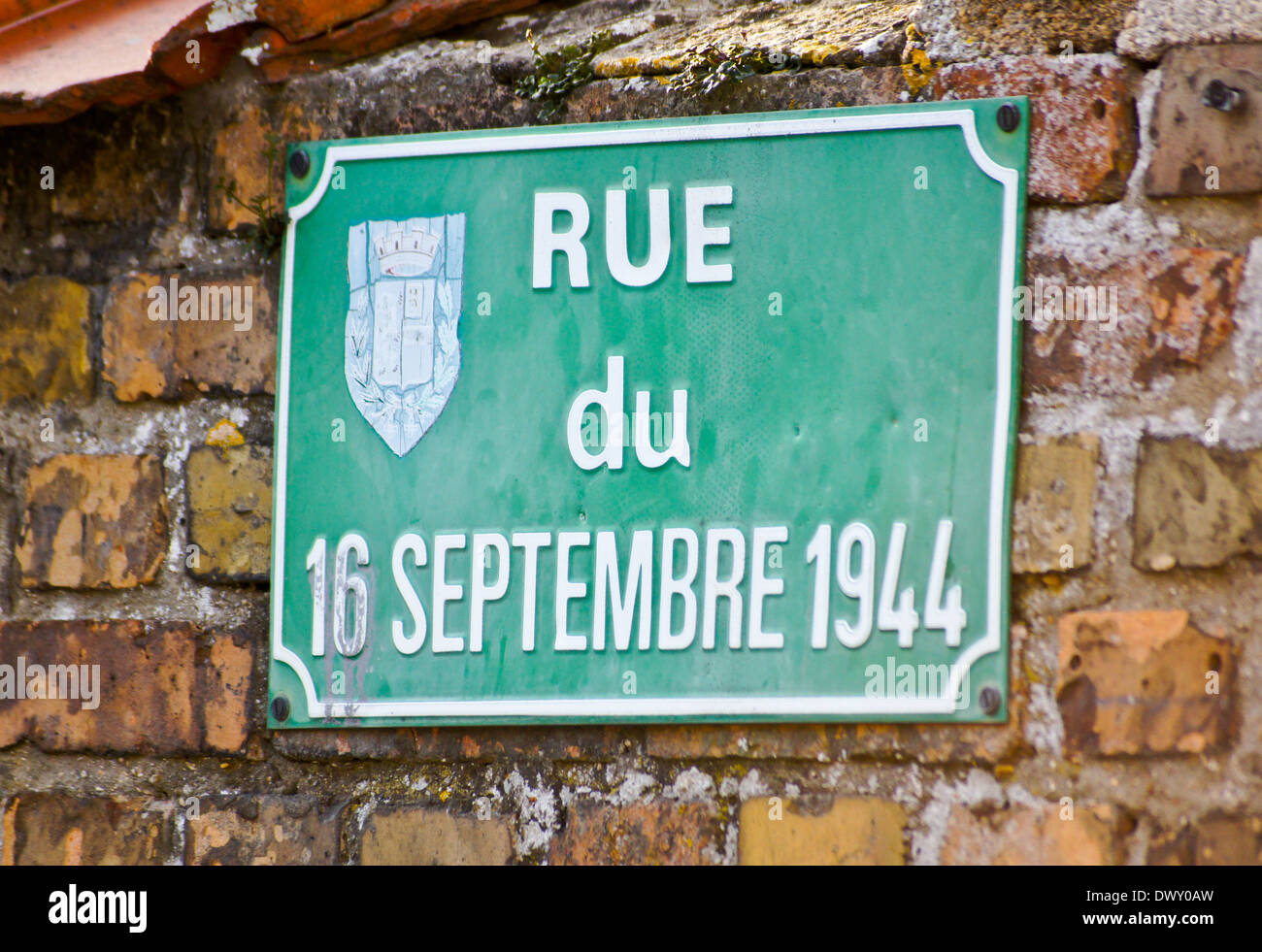 Street sign 'Rue du 16 Septembre 1944', commemorating the liberation in World War 2, Bergues, Nord Pas de Calais, France Stock Photo