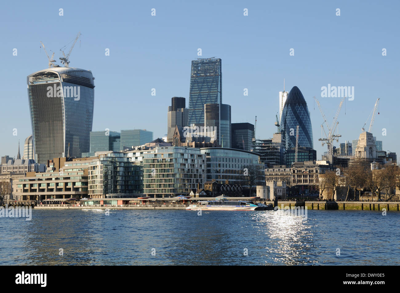 The City of London from the South Bank with the Gerkin, and the Walkie Talkie tower nearing completion, in March 2014, London UK Stock Photo
