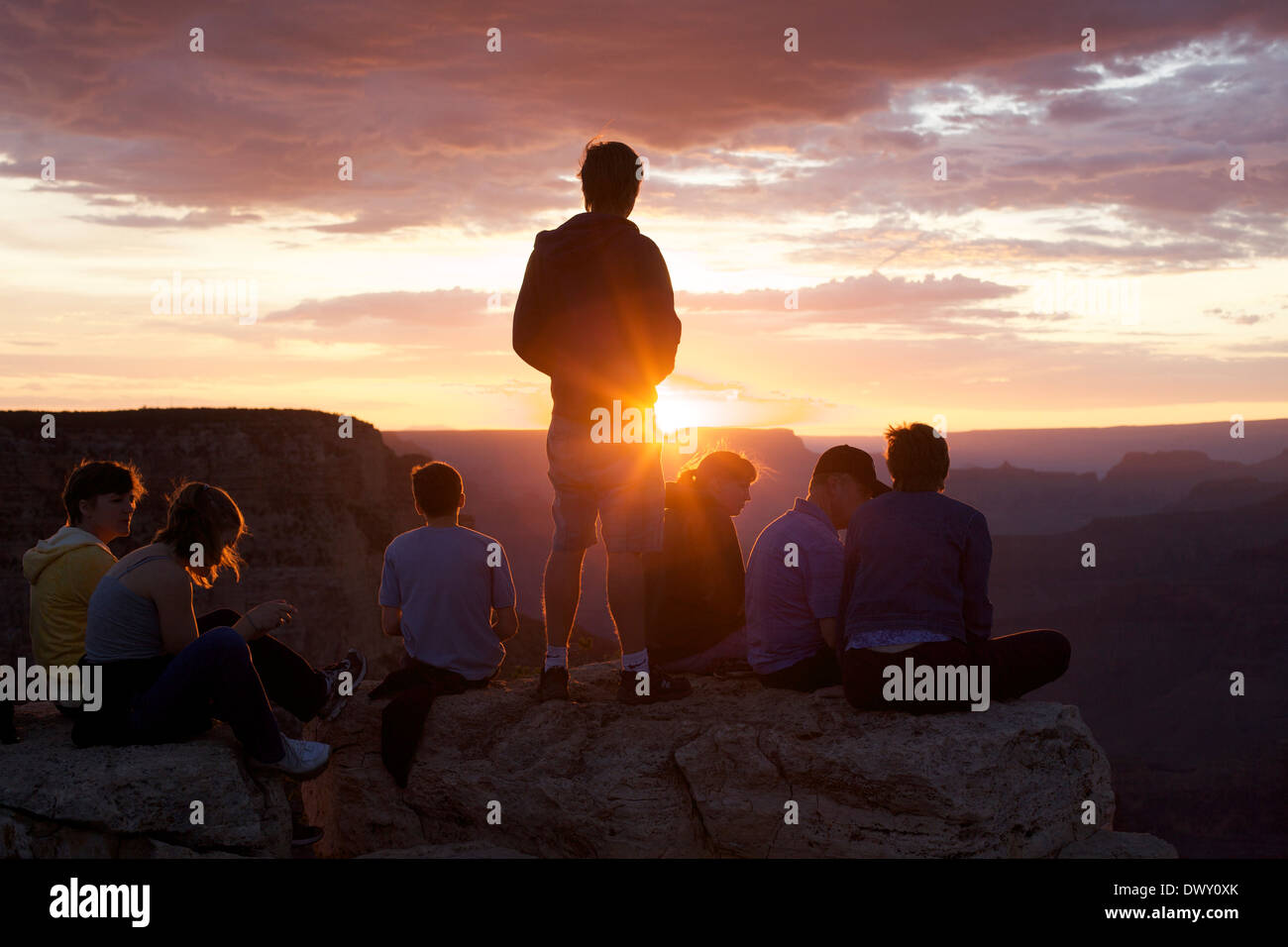 USA, Arizona, Grand Canyon National Park, Friends enjoying sunrise Stock Photo